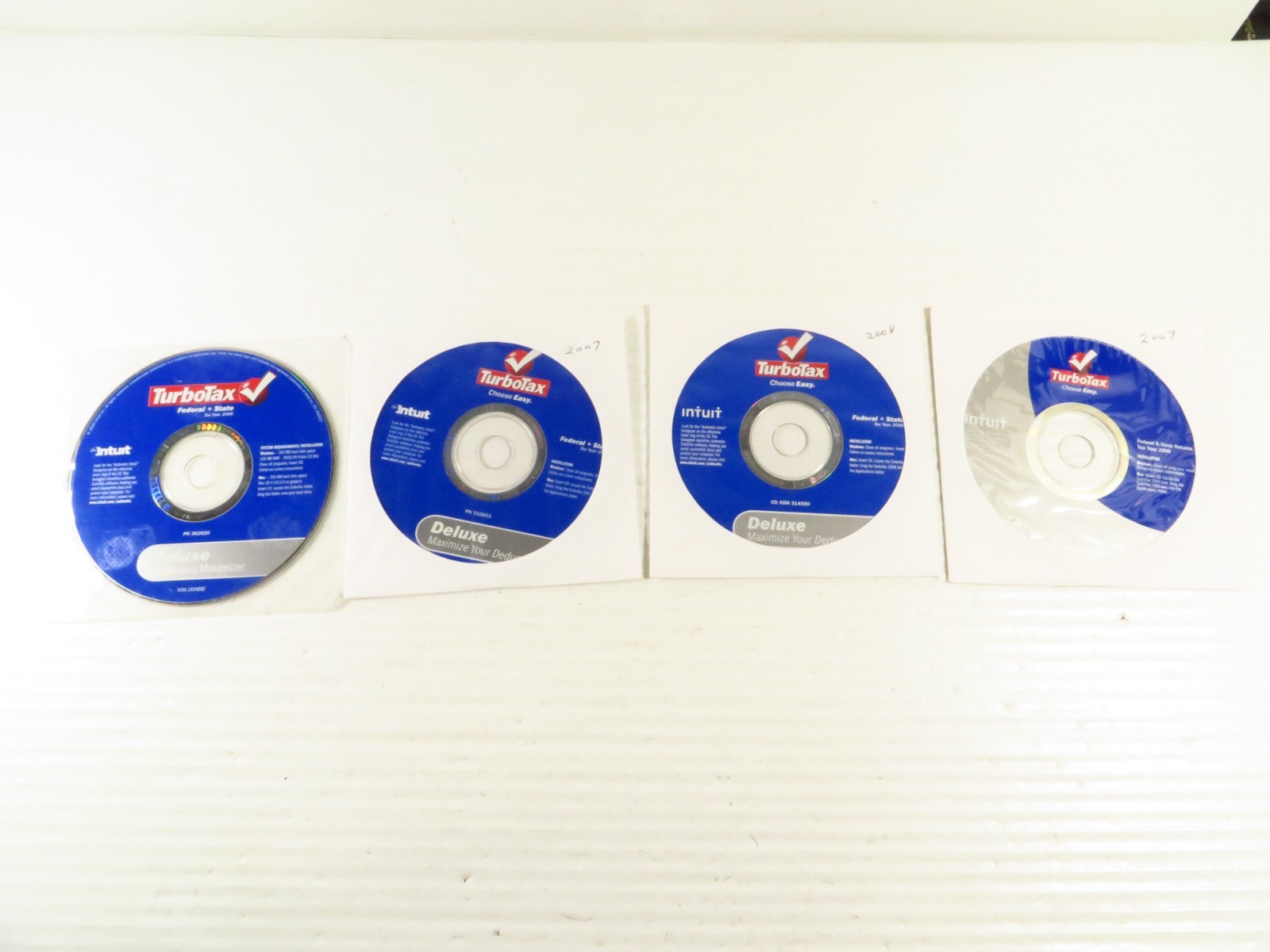 4 PK Intuit TurboTax Deluxe Federal+State (Win/Mac) Bundle: 2006/2007/2008/2009