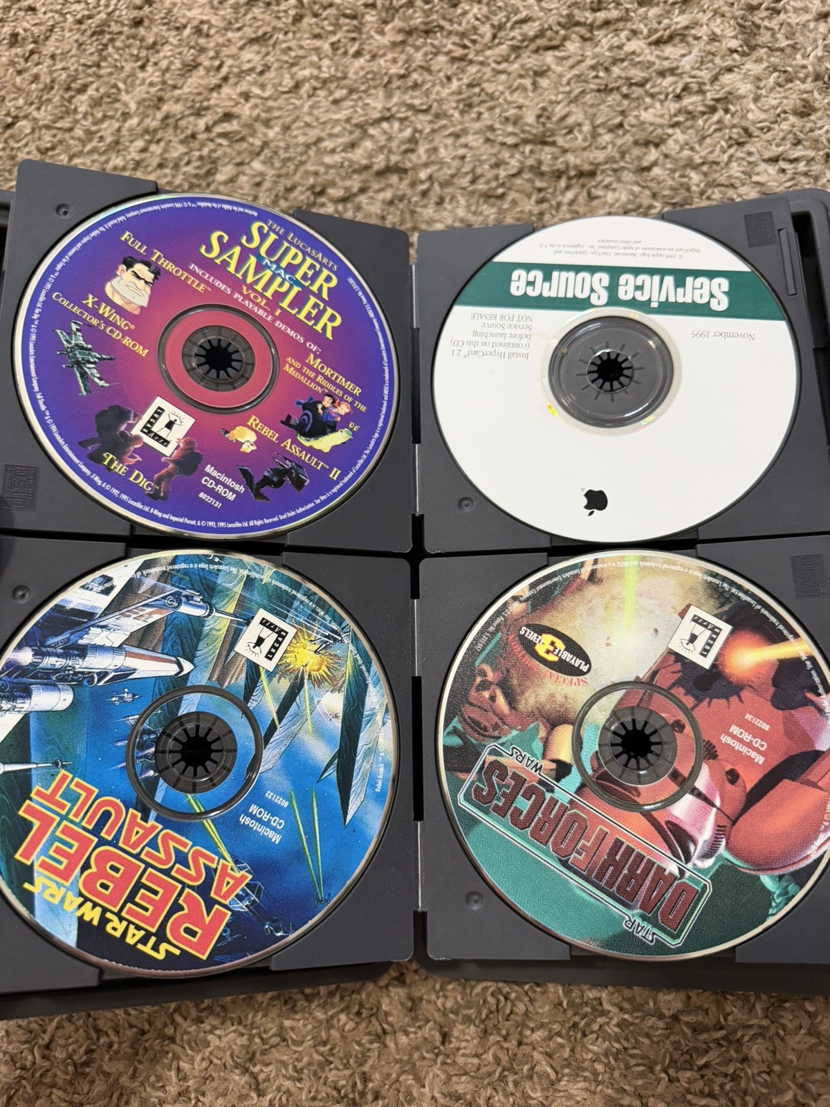 VINTAGE CD CASE WITH 7 MACINTOSH CD-ROM DISCS UNTESTED GAMES ETC.