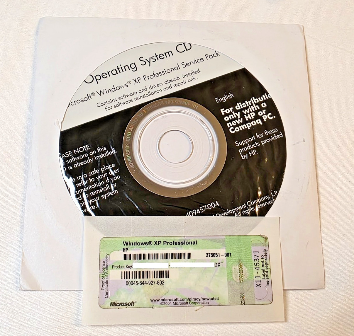 HP Compaq 32-bit Windows XP Professional Service Pack NEW w/ Product Code – GXT